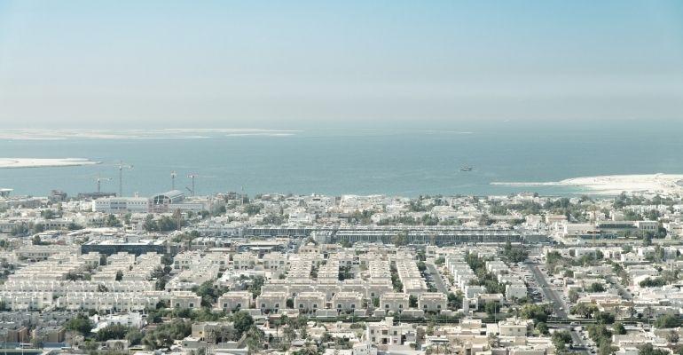 Dubai residential housing during the afternoon sun with blue sky