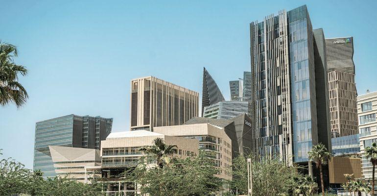 Skyscrapers of King Abdullah Financial District in Riyadh on a sunny day with blue sky.jpg