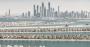 The Palm Jumeirah in Dubai with Dubai city skyline behind.jpg